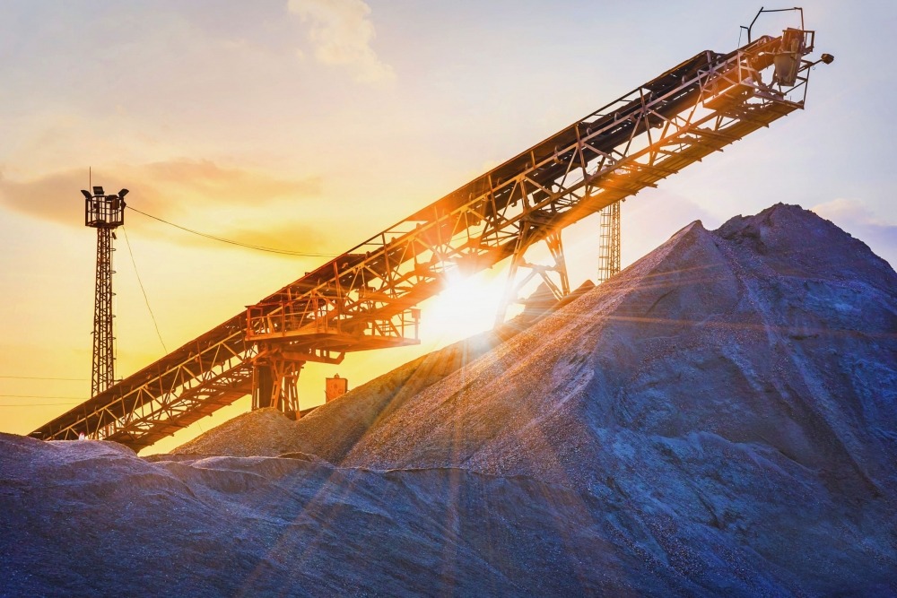 ETQ qms metals and mining mining quarry with sunrise