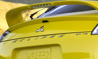 Rear view of bright yellow Mitsubishi Eclipse